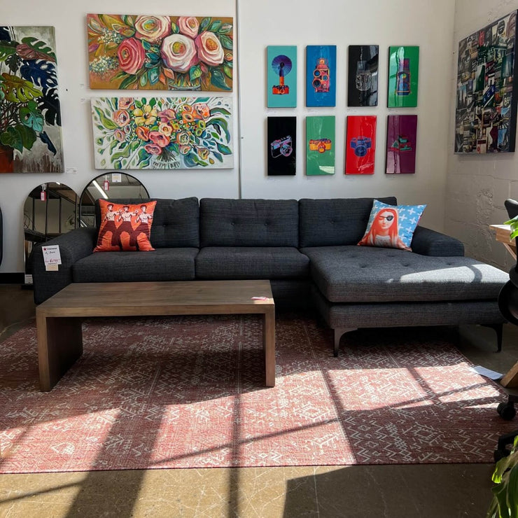 Colyn Reversible Sectional Sofa - Floor Model